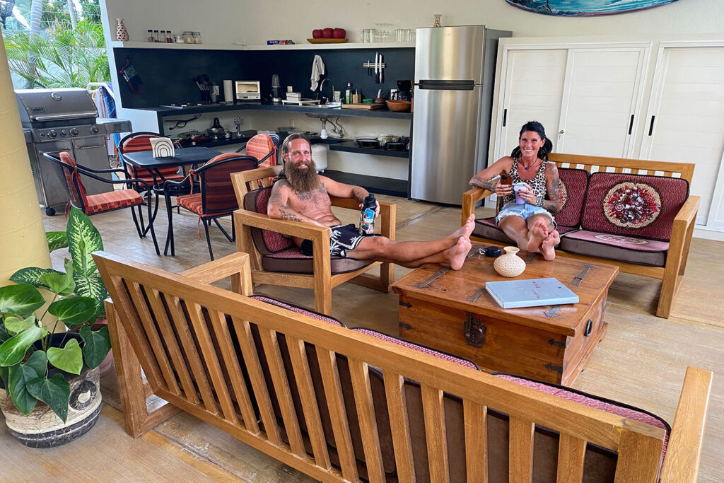 Guests enjoy the outdoor seating area at Zandoyo. The new community kitchen is behind them.