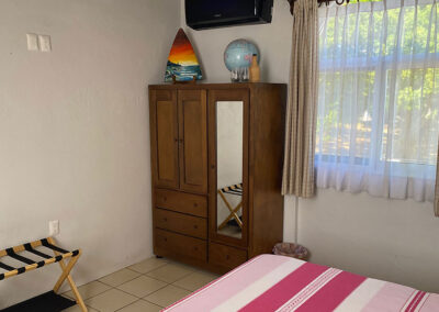 Angelina is a room with a view of the park in front of Zandoyo Bed & Breakfast.