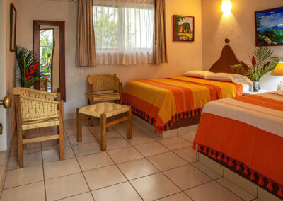 Ines is a double room with two queen beds at Zandoyo Bed & Breakfast in Puerto Escondido