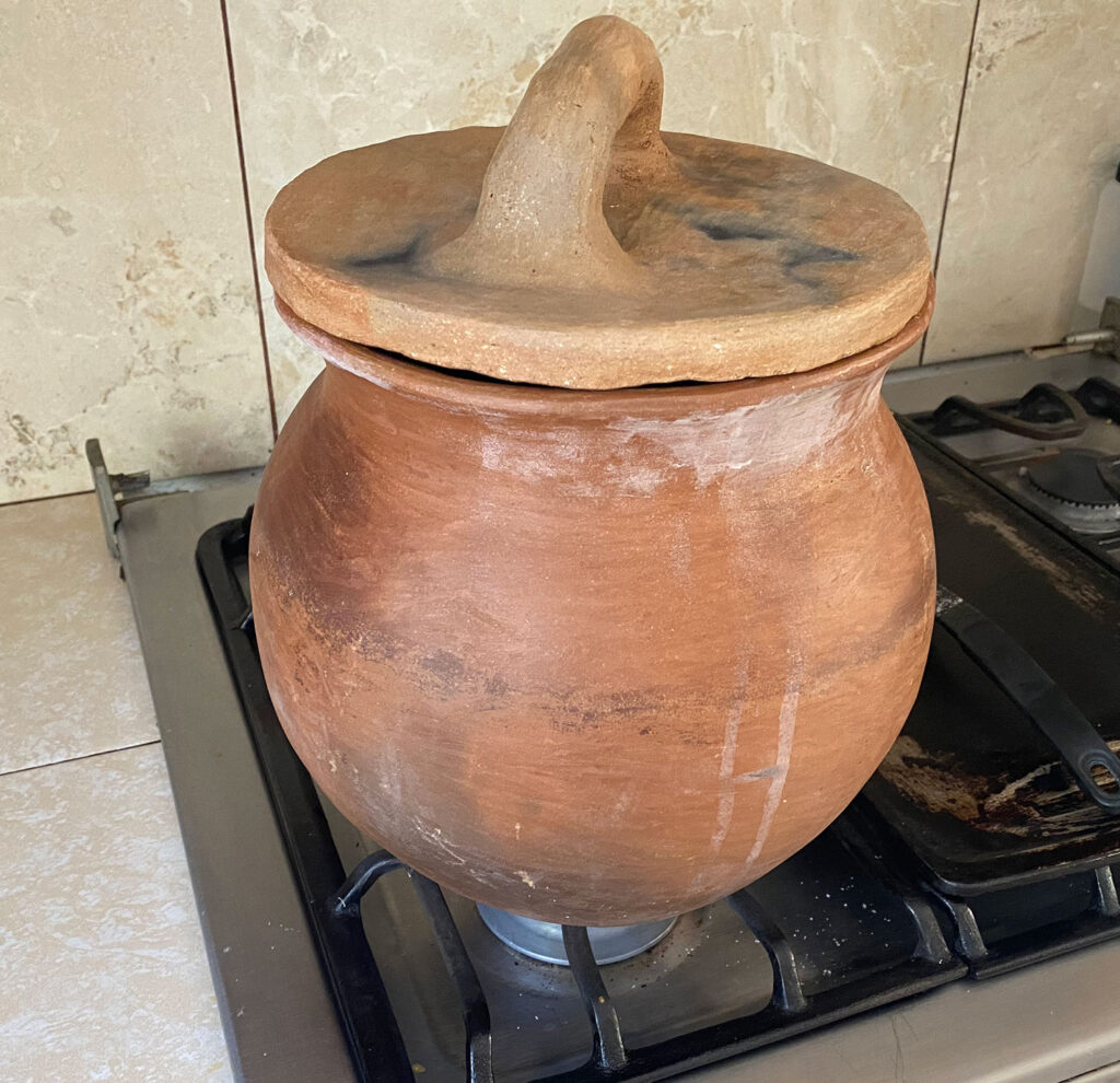 the clay pot we use to cook our beans